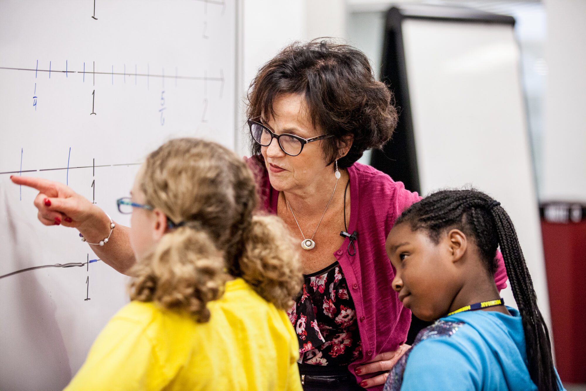 Deborah Loewenberg Ball working with elementary aged school children at a white board