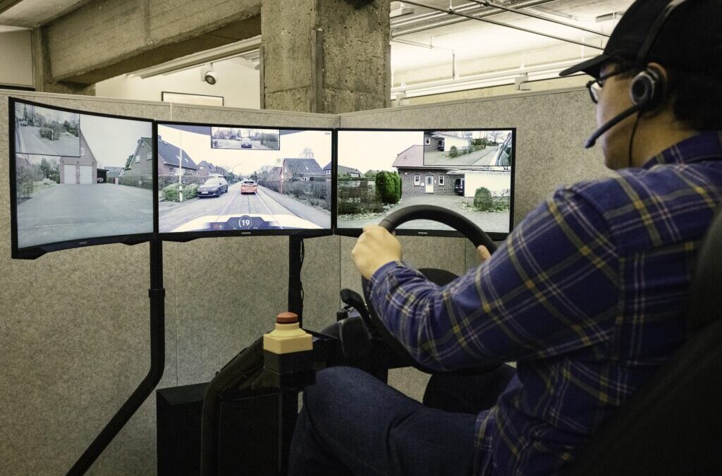 A Vay driver operates a vehicle remotely from a control center that features multiple video feeds. Tele-driving could offer many of the efficiencies that autonomous vehicles are expected to provide, according to research at U-M. Image credit: Vay