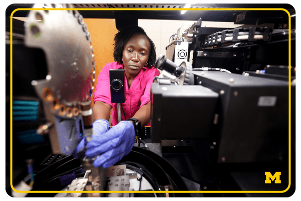Lead XRM Scientist Nancy Muyanja prepares a 18650 Cell by placing it in the Zeiss Xradia Versa 520 X-ray Microscope inside the U-M Center for Materials Characterization.