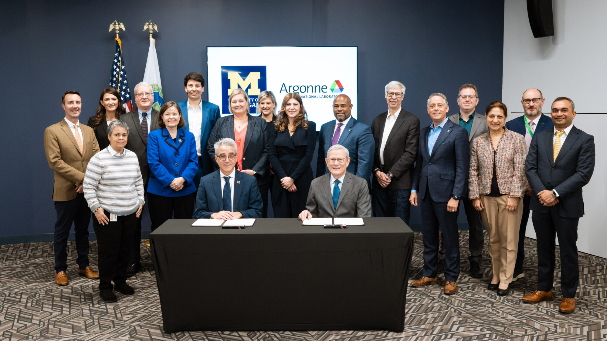 Leaders from the University of Michigan and Argonne National Lab in a group photo after the MOU signing.