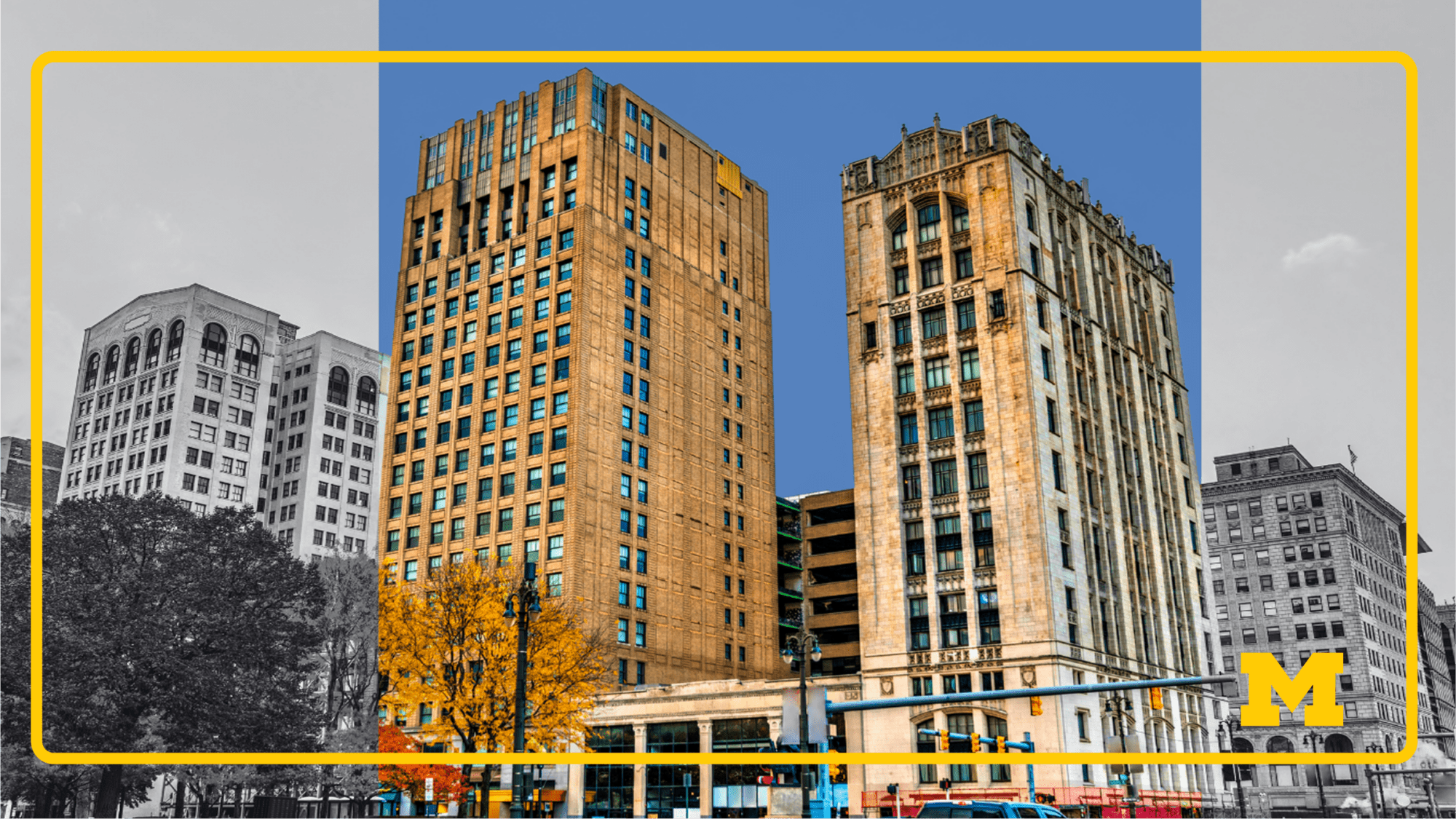 Two tall historic buildings stand side by side in a downtown area, with trees and cars lining the street in front. The center of the image is shown in full color, highlighting the golden tones of the buildings, autumn leaves on the tree, and a bright blue sky, while the surrounding area is in black and white.