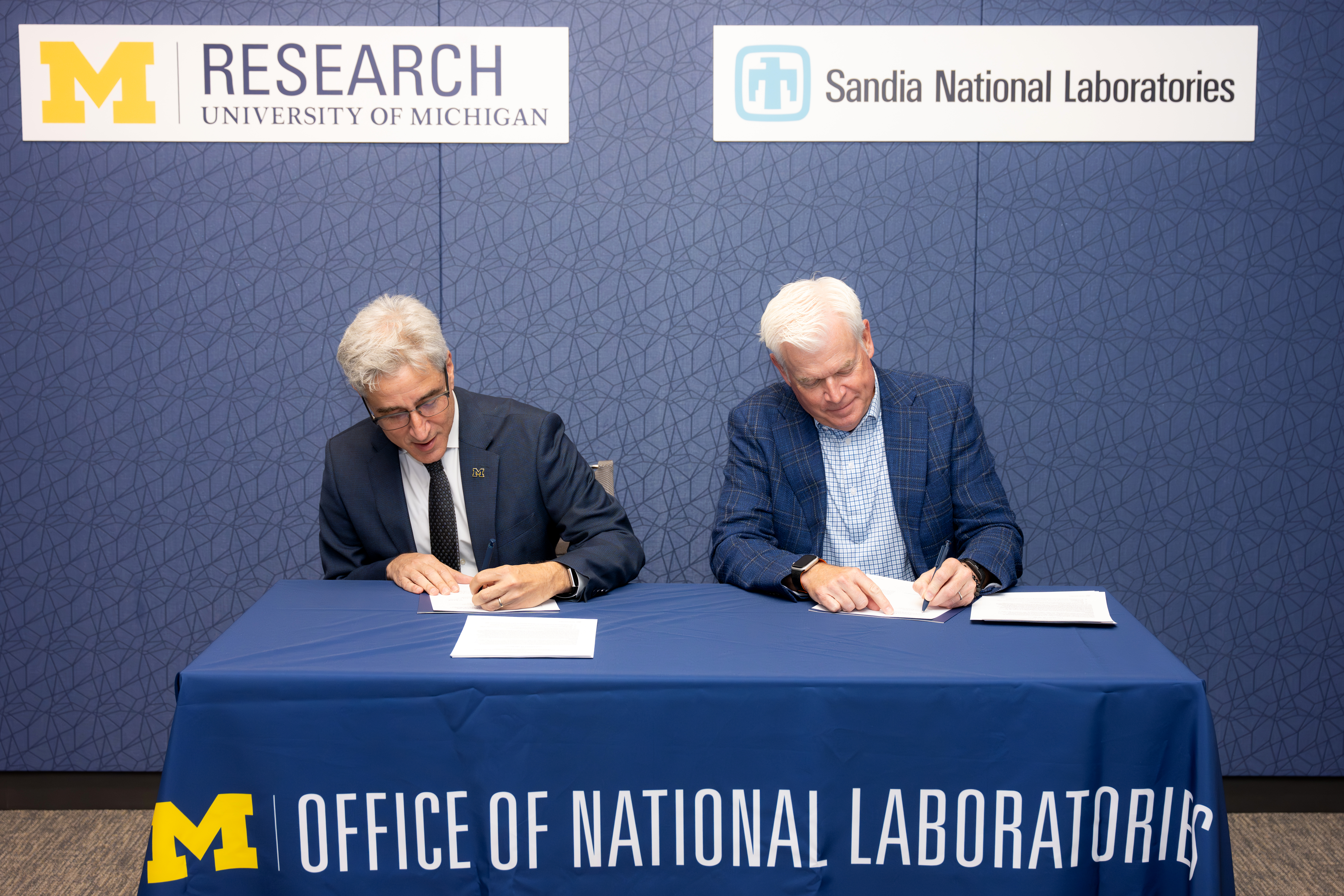 The Vice President of Research meets with the leaders of Sandia National Labs to sign a historical agreement of understanding